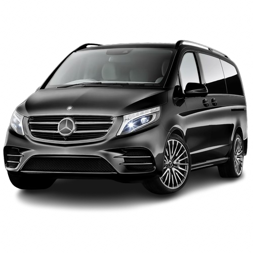 chauffeur in front of luxury Mercedes Van with sign that says BEG airport transfer